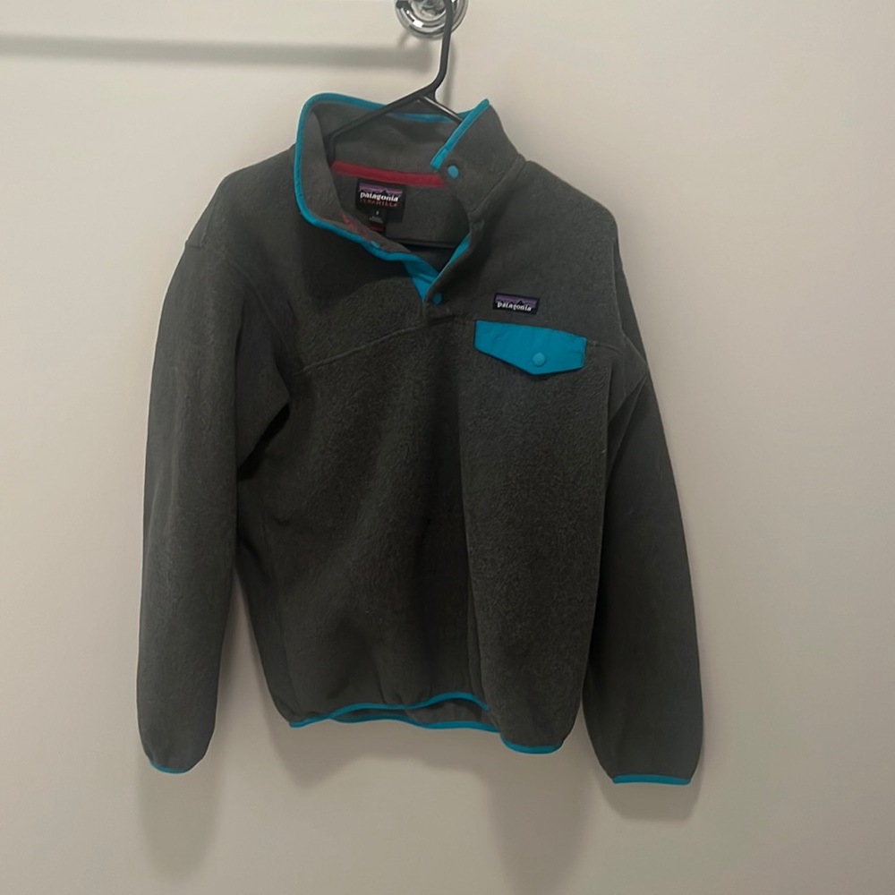 Grey Patagonia with blue accent